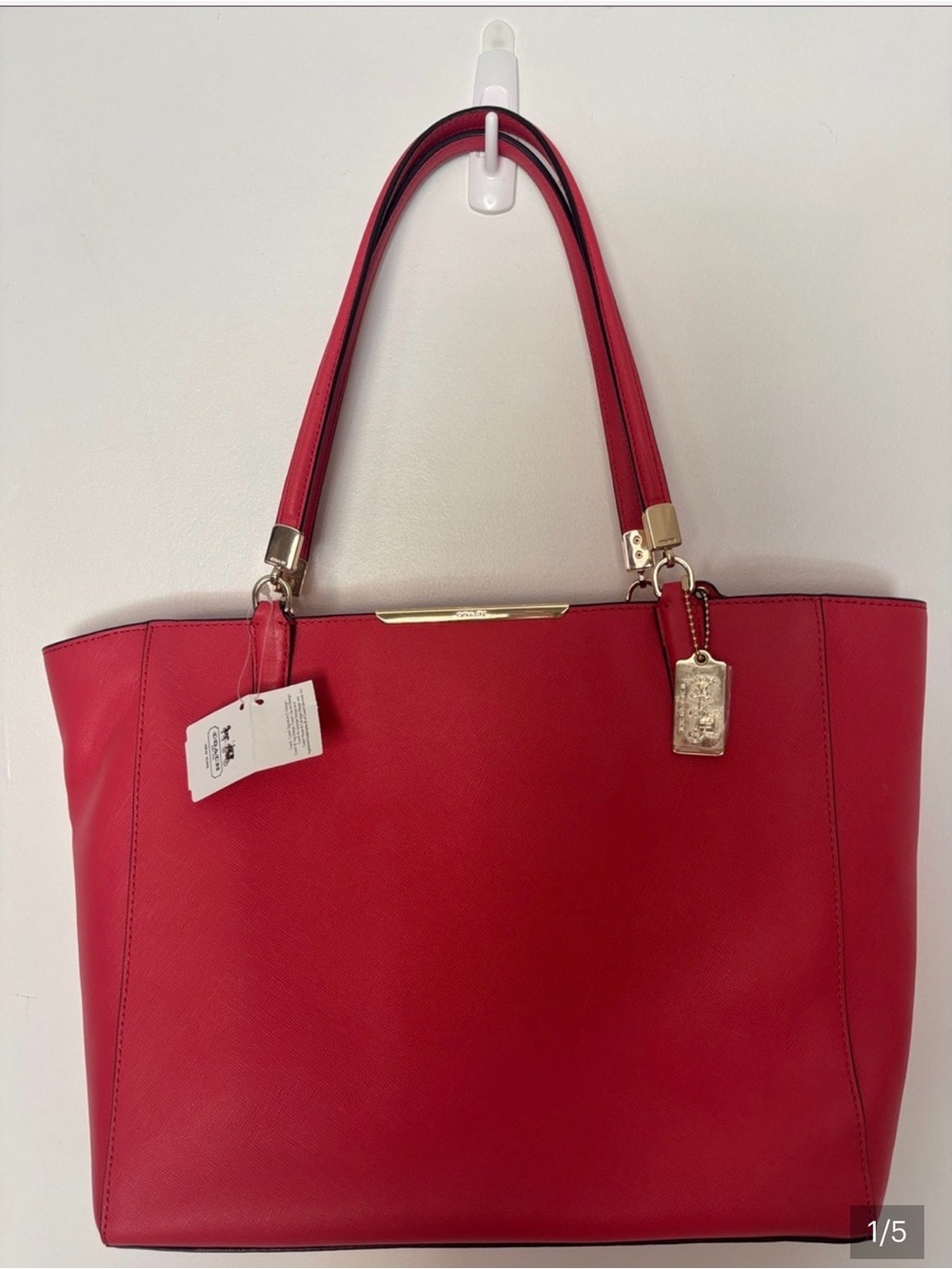 Coach Madison Saffiano leather east-west tote bag
With dusty